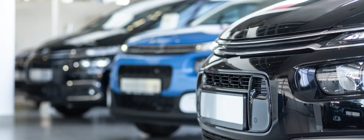 low-angle-of-extravagance-store-with-cars-in-a-row-2024-10-20-15-01-53-utc