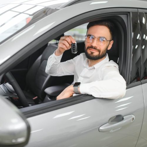 yes-that-s-my-new-car-customer-in-car-dealership-2023-09-22-04-02-05-utc